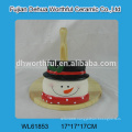 Ceramic tissue holder in snowman shape with wooden part